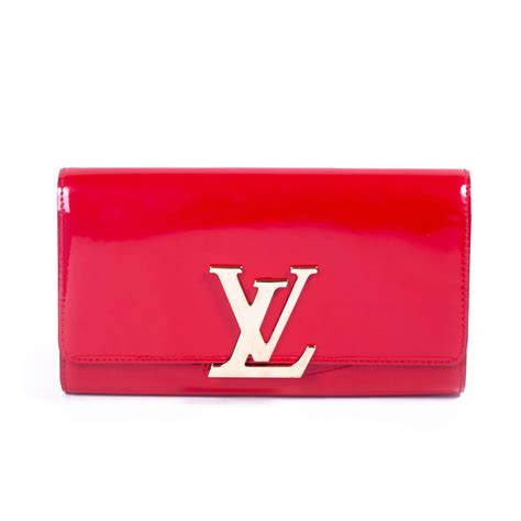 louis vuitton clutch with leather strap|louis vuitton vernis clutch.